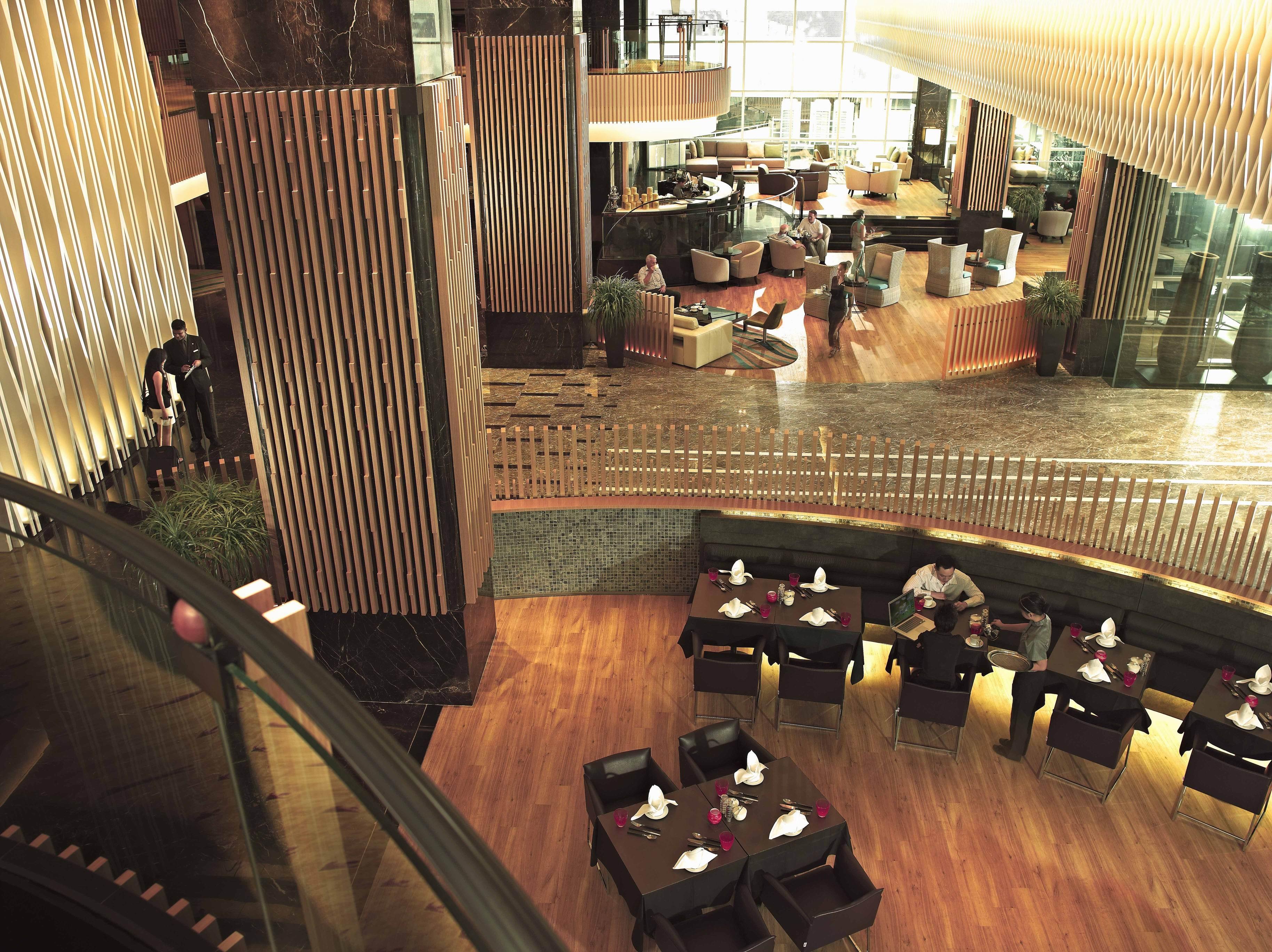 Pan Pacific Orchard Hotel Singapore Exterior photo The interior of the restaurant