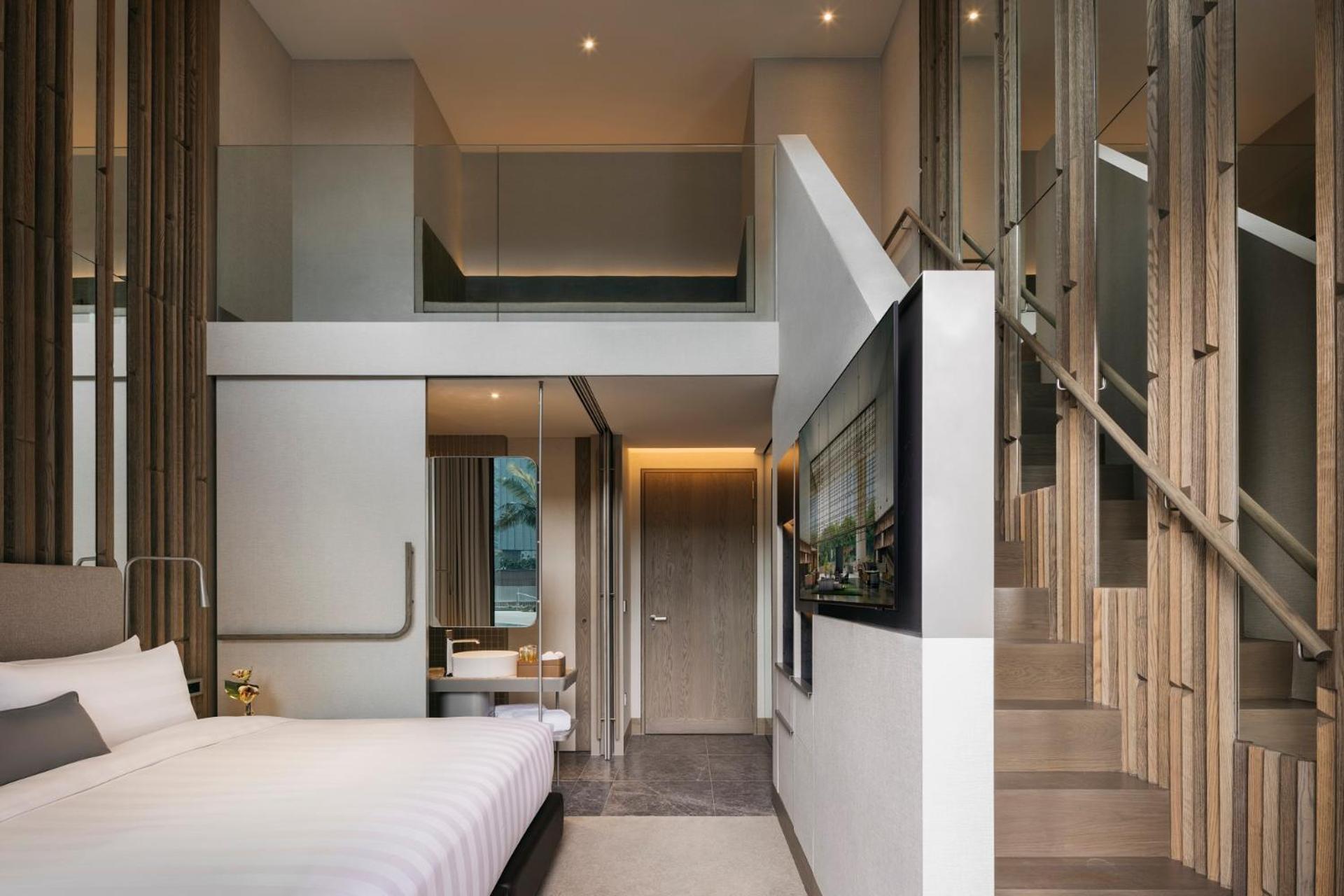 Pan Pacific Orchard Hotel Singapore Exterior photo The interior of a duplex suite