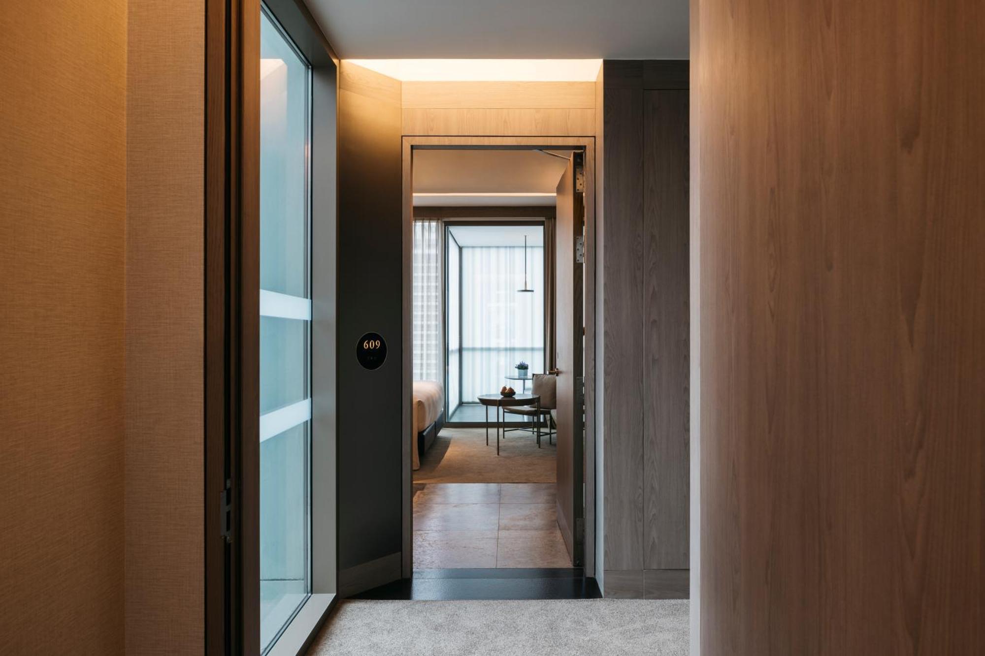 Pan Pacific Orchard Hotel Singapore Exterior photo A typical apartment entrance